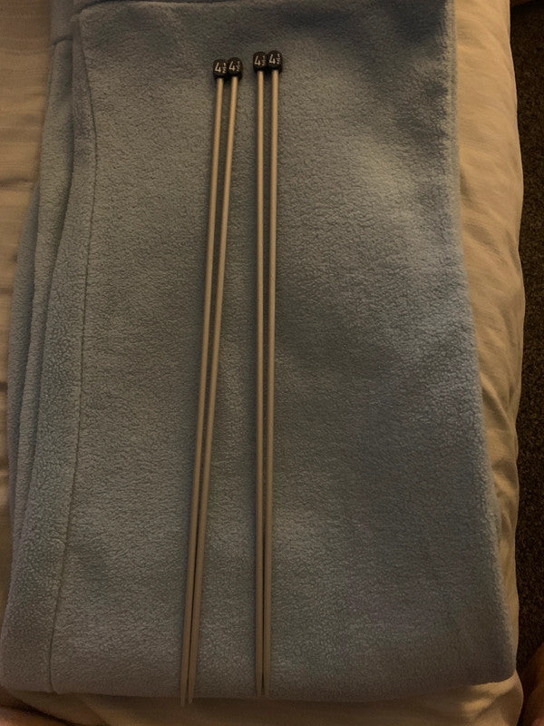 Two pairs of 4½ mm straight knitting needles