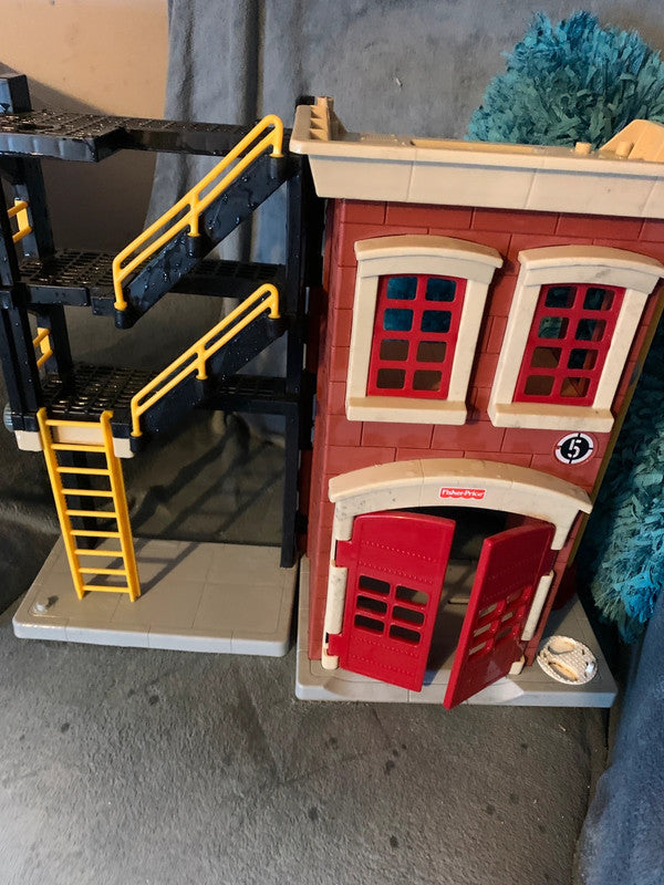 Fisher-Price Rescue Heroes Firehouse playset.