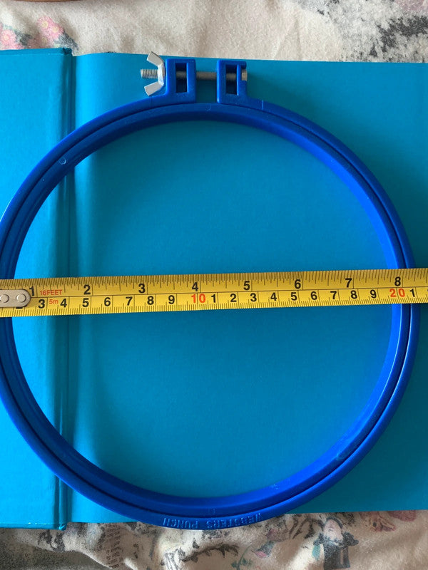 plastic embroidery hoop (sometimes also called a cross-stitch or needlework hoop)