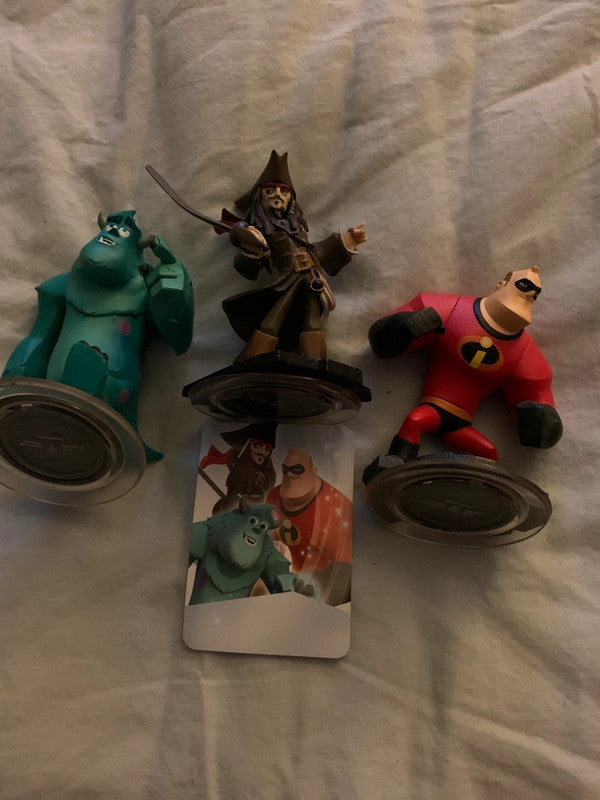 Disney Infinity 1.0 Starter Pack Figure Set, featuring Mr. Incredible, Jack Sparrow, and Sulley