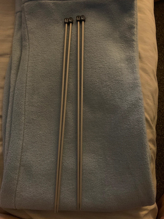 Two pairs of 4½ mm straight knitting needles