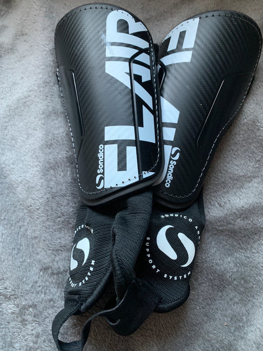 football (soccer) shin guards with ankle support.