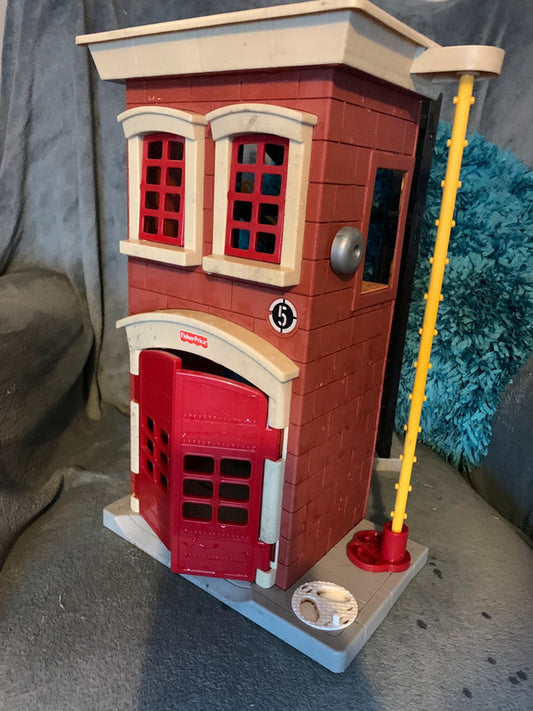 Fisher-Price Rescue Heroes Firehouse playset.